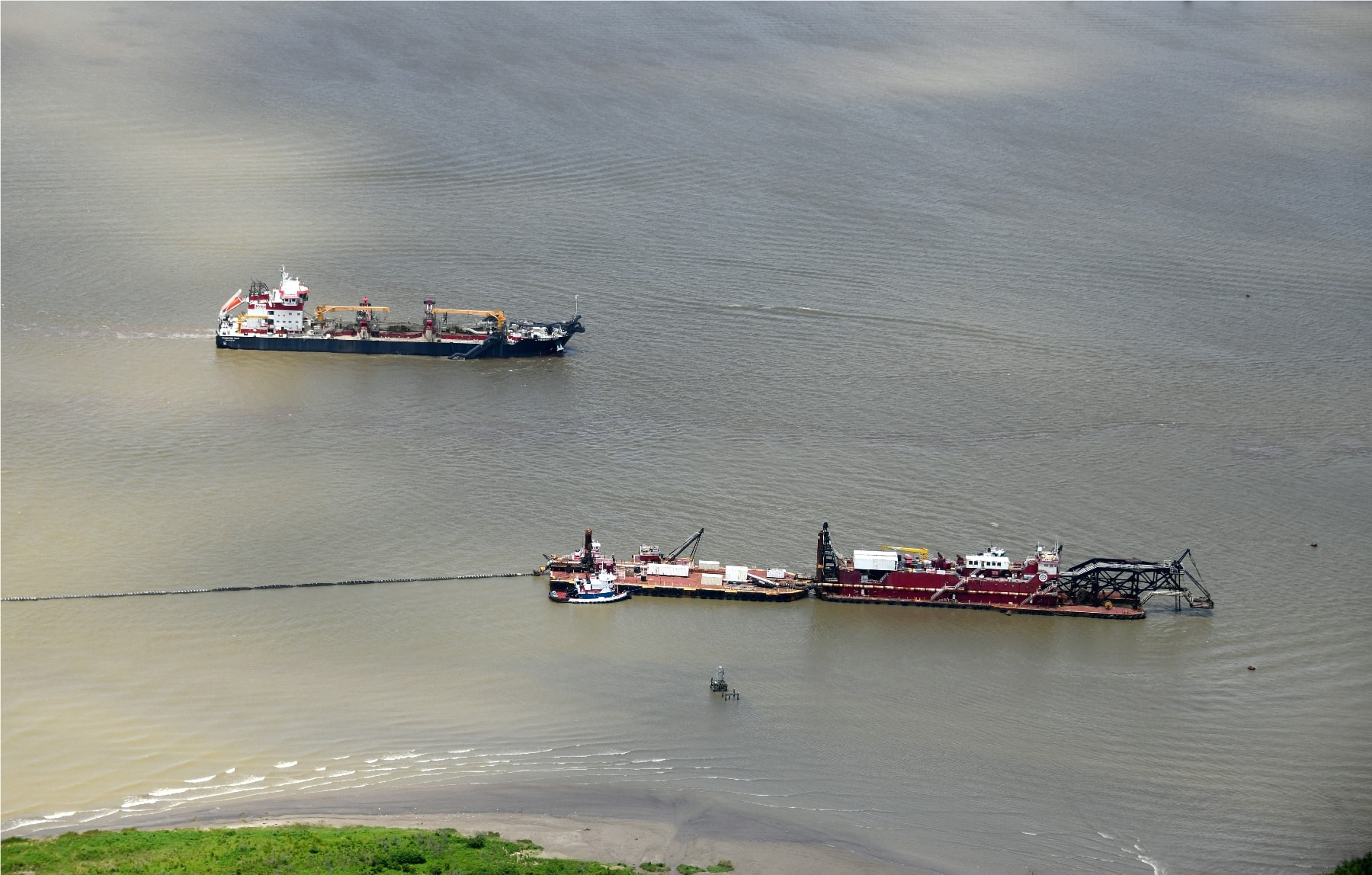 Hopper dredge and cutter suction dredge operating at the Birds Foot Delta south of Venice, Louisiana